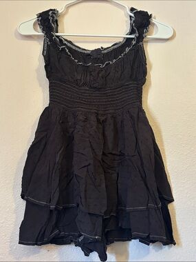 Urban Outfitters Womanโs Black Romper W/White Trim and Ruffled Bottom, Size XS